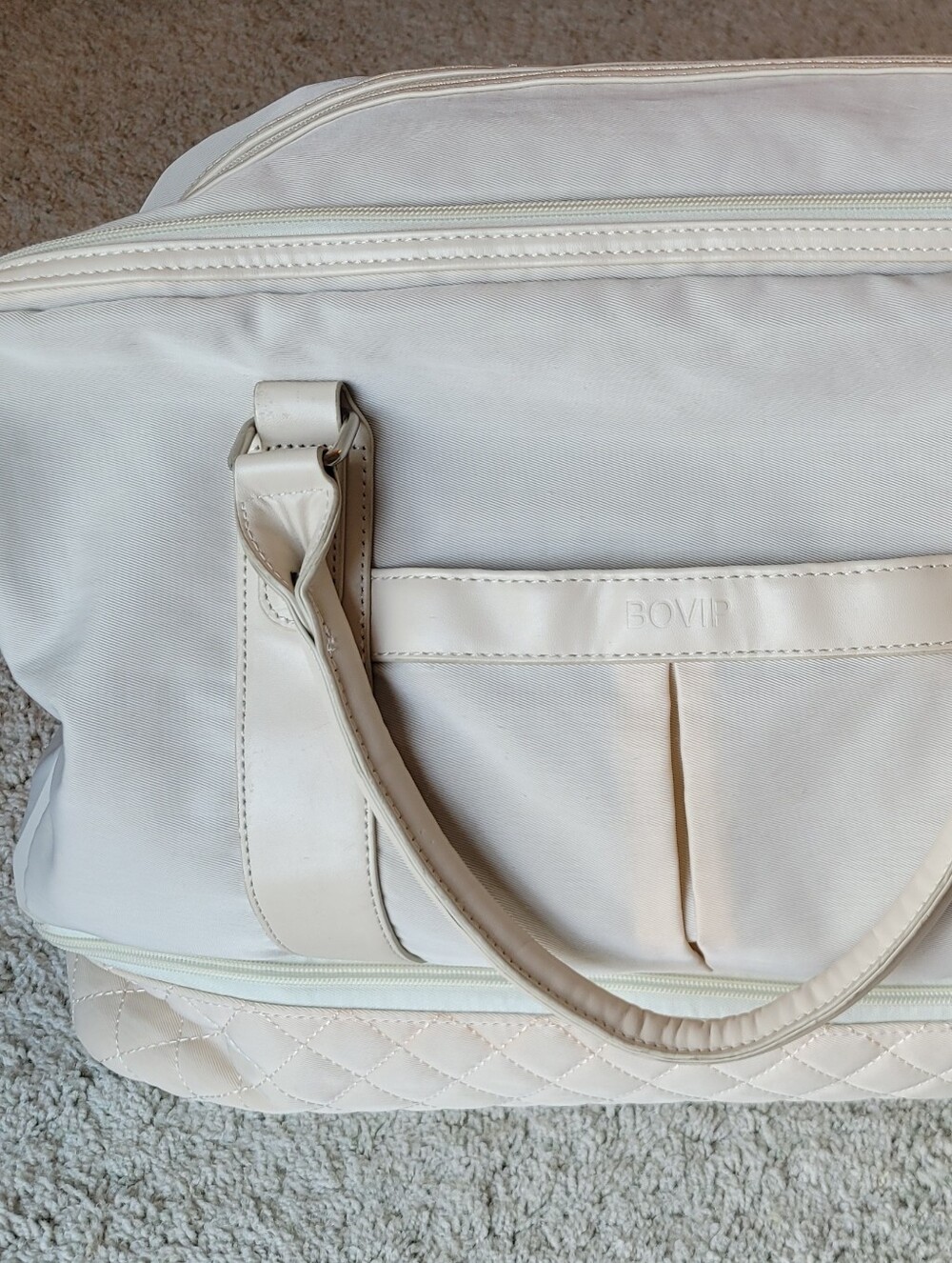 Nuetral Color Very Useful Item  Many Pockets, One For Shoes, Wet Items Zippered